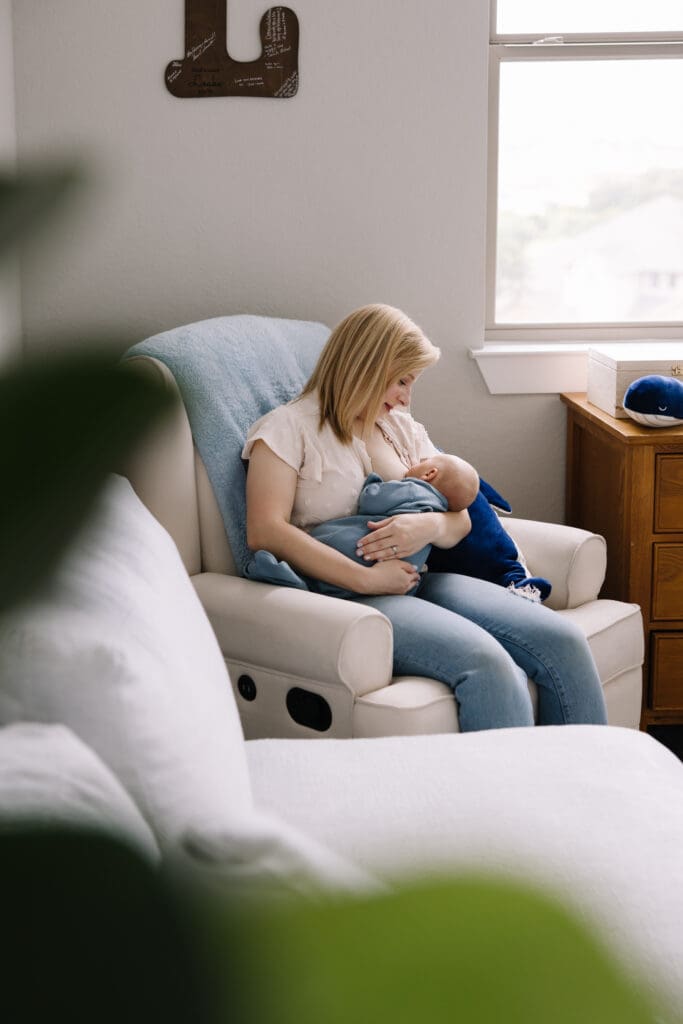 An intimate in-home breastfeeding photography session in San Antonio. Featuring a mother and baby sharing a quiet moment of connection. Captured in natural light, this lifestyle photo highlights the emotional bond and beauty of motherhood. Perfect example of documentary-style breastfeeding photography for families seeking authentic memories at home.
